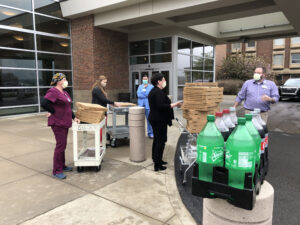 MCBA donates Homegrown Pizza to health care workers at Mon Health, Ruby